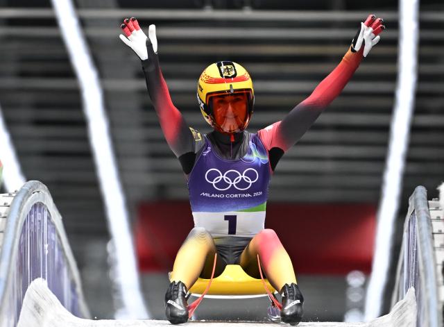 (260210) -- CORTINA D'AMPEZZO, Feb. 10, 2026 (Xinhua) -- Julia Taubitz of Germany celebrates during the luge women's singles run 3 at the Milan-Cortina 2026 Olympic Winter Games in Cortina, Italy, Feb. 10, 2026. (Xinhua/Lian Yi)