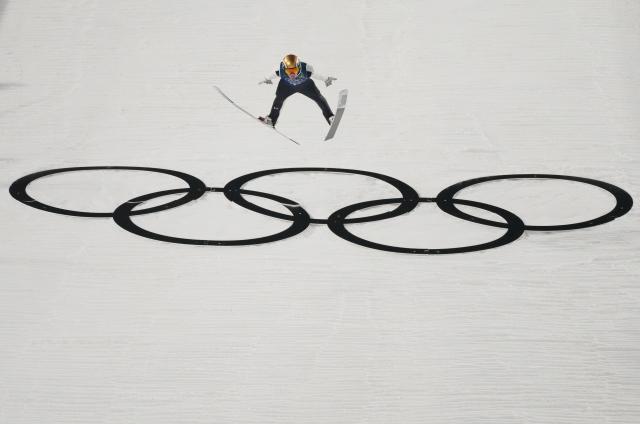 (260210) -- PREDAZZO, Feb. 10, 2026 (Xinhua) -- Domen Prevc of Slovenia competes during the ski jumping mixed team final round match at the Milan-Cortina 2026 Olympic Winter Games in Predazzo, Italy, Feb. 10, 2026. (Xinhua/Huang Wei)