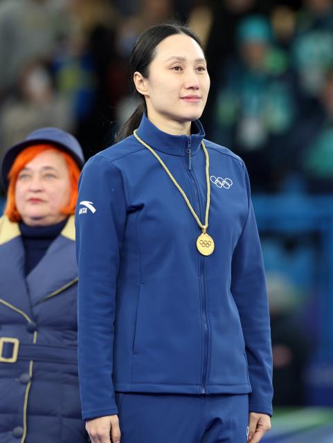 (260210) -- CORTINA D'AMPEZZO, Feb. 10, 2026 (Xinhua) -- International Olympic Committee (IOC) member Zhang Hong attends the awarding ceremony of the curling mixed doubles at the Milan-Cortina 2026 Olympic Winter Games in Cortina, Italy, Feb. 10, 2026. (Xinhua/Ding Xu)