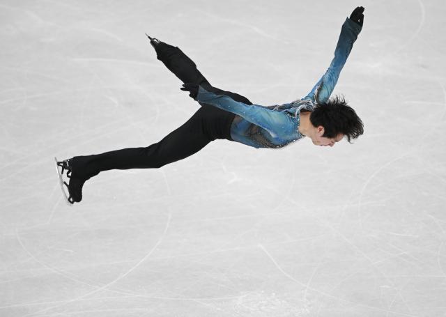 (260210) -- MILAN, Feb. 10, 2026 (Xinhua) -- Jin Boyang of China competes during the short program competition of figure skating men single skating at the Milan-Cortina 2026 Olympic Winter Games in Milan, Italy, Feb. 10, 2026. (Xinhua/Cheng Min)