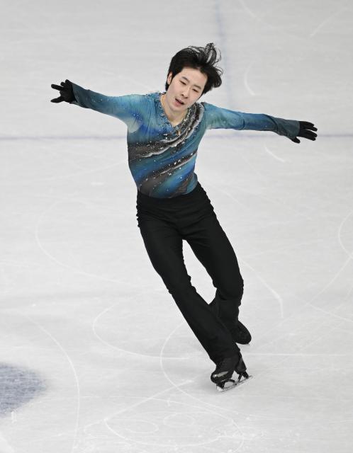(260210) -- MILAN, Feb. 10, 2026 (Xinhua) -- Jin Boyang of China competes during the short program competition of figure skating men single skating at the Milan-Cortina 2026 Olympic Winter Games in Milan, Italy, Feb. 10, 2026. (Xinhua/Cheng Min)