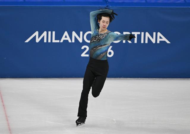 (260210) -- MILAN, Feb. 10, 2026 (Xinhua) -- Jin Boyang of China competes during the short program competition of figure skating men single skating at the Milan-Cortina 2026 Olympic Winter Games in Milan, Italy, Feb. 10, 2026. (Xinhua/Cheng Min)