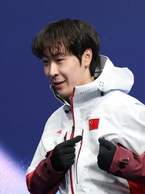 (260210) -- MILAN, Feb. 10, 2026 (Xinhua) -- Jin Boyang of China poses during the short program competition of figure skating men single skating at the Milan-Cortina 2026 Olympic Winter Games in Milan, Italy, Feb. 10, 2026. (Xinhua/Li Ming)