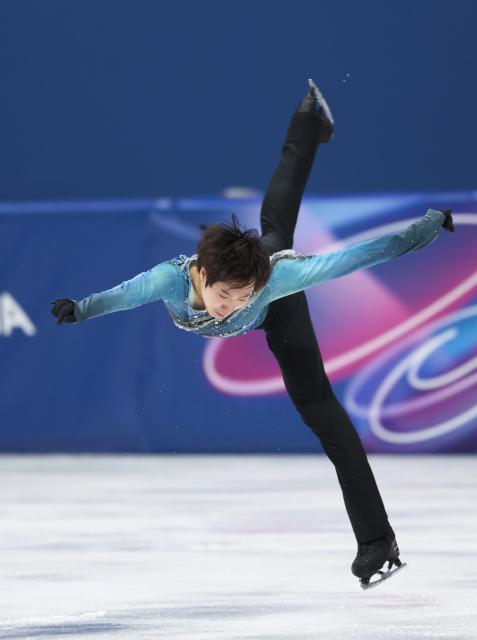 (260210) -- MILAN, Feb. 10, 2026 (Xinhua) -- Jin Boyang of China competes during the short program competition of figure skating men single skating at the Milan-Cortina 2026 Olympic Winter Games in Milan, Italy, Feb. 10, 2026. (Xinhua/Li Ming)