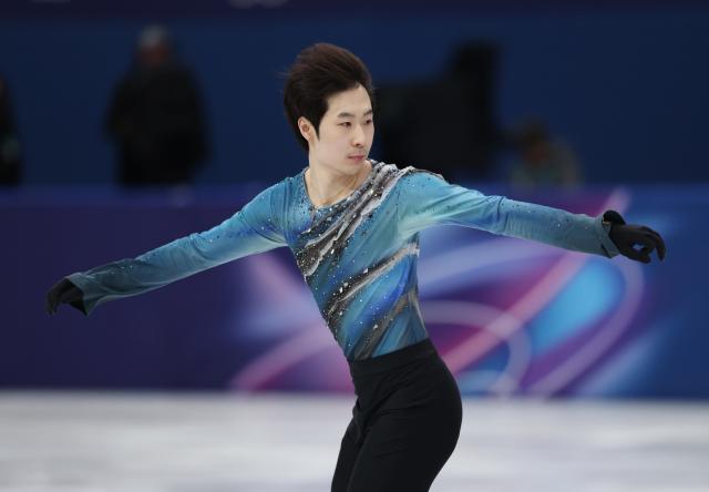 (260210) -- MILAN, Feb. 10, 2026 (Xinhua) -- Jin Boyang of China competes during the short program competition of figure skating men single skating at the Milan-Cortina 2026 Olympic Winter Games in Milan, Italy, Feb. 10, 2026. (Xinhua/Li Ming)