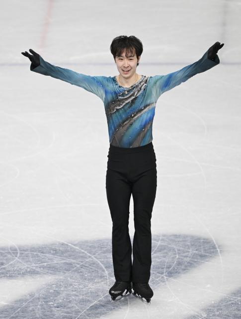 (260210) -- MILAN, Feb. 10, 2026 (Xinhua) -- Jin Boyang of China competes during the short program competition of figure skating men single skating at the Milan-Cortina 2026 Olympic Winter Games in Milan, Italy, Feb. 10, 2026. (Xinhua/Cheng Min)