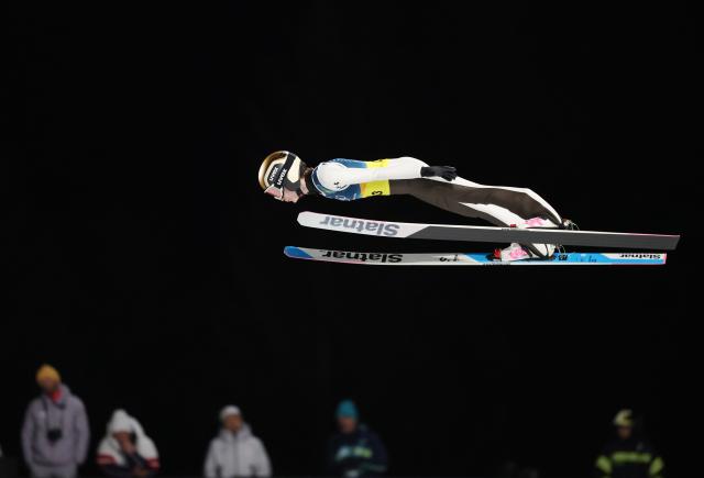 (260210) -- PREDAZZO, Feb. 10, 2026 (Xinhua) -- Nika Prevc of Slovenia competes during the trial round match of ski jumping mixed team at the Milan-Cortina 2026 Olympic Winter Games in Predazzo, Italy, Feb. 10, 2026. (Xinhua/Huang Wei)