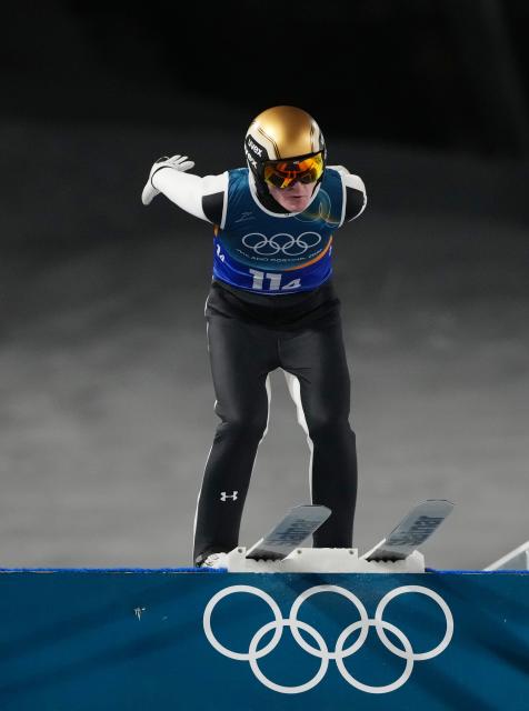 (260210) -- PREDAZZO, Feb. 10, 2026 (Xinhua) -- Domen Prevc of Slovenia competes during the trial round match of ski jumping mixed team at the Milan-Cortina 2026 Olympic Winter Games in Predazzo, Italy, Feb. 10, 2026. (Xinhua/Meng Yongmin)
