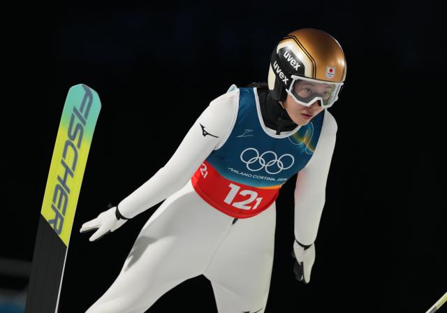 (260210) -- PREDAZZO, Feb. 10, 2026 (Xinhua) -- Maruyama Nozomi of Japan competes during the trial round match of ski jumping mixed team at the Milan-Cortina 2026 Olympic Winter Games in Predazzo, Italy, Feb. 10, 2026. (Xinhua/Meng Yongmin)