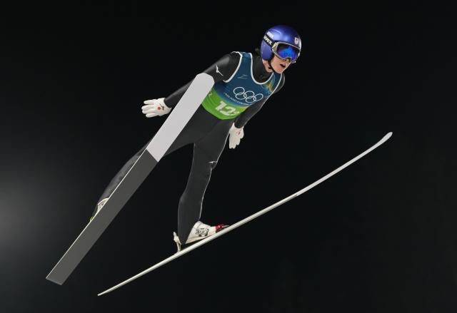 (260210) -- PREDAZZO, Feb. 10, 2026 (Xinhua) -- Kobayashi Ryoyu of Japan competes during the 1st round match of ski jumping mixed team at the Milan-Cortina 2026 Olympic Winter Games in Predazzo, Italy, Feb. 10, 2026. (Xinhua/Meng Yongmin)