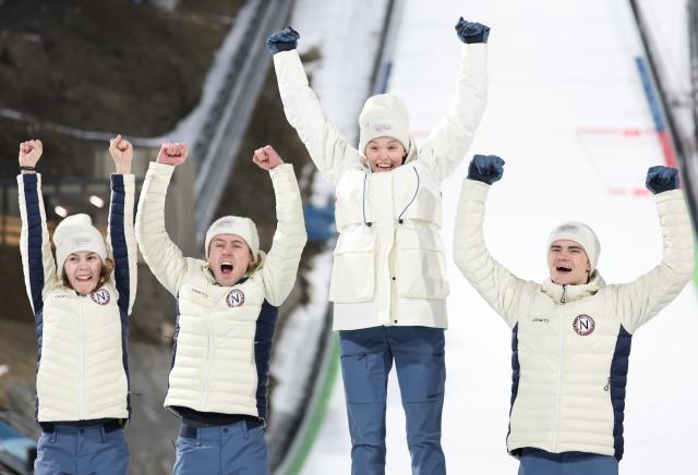 (260210) -- PREDAZZO, Feb. 10, 2026 (Xinhua) -- Silver medalists Anna Odine Stroem, Kristoffer Eriksen Sundal, Eirin Maria Kvandal, and Marius Lindvik of Norway celebrate during the awarding ceremony of the ski jumping mixed team match at the Milan-Cortina 2026 Olympic Winter Games in Predazzo, Italy, Feb. 10, 2026. (Xinhua/Huang Wei)