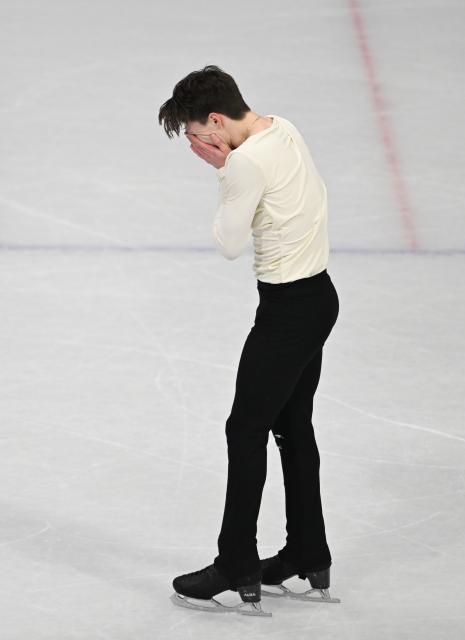 (260210) -- MILAN, Feb. 10, 2026 (Xinhua) -- Maxim Naumov of the United States reacts during the short program competition of figure skating men single skating at the Milan-Cortina 2026 Olympic Winter Games in Milan, Italy, Feb. 10, 2026. (Xinhua/Cheng Min)