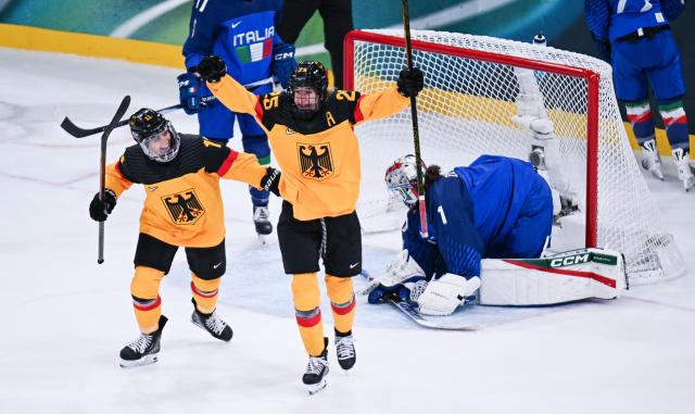 (260210) -- MILAN, Feb. 10, 2026 (Xinhua) -- Laura Kluge (2nd L) of Germany celebrates her goal during the ice hockey women's preliminary round group B match between Germany and Italy of the Milan-Cortina 2026 Olympic Winter Games in Milan, Italy, Feb. 10, 2026. (Xinhua/Tao Xiyi)