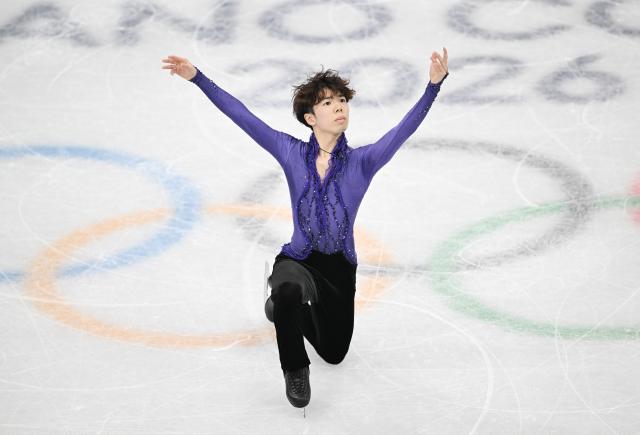 (260211) -- MILAN, Feb. 11, 2026 (Xinhua) -- Sato Shun of Japan performs during the short program competition of figure skating men single skating at the Milan-Cortina 2026 Olympic Winter Games in Milan, Italy, Feb. 10, 2026. (Xinhua/Cheng Min)