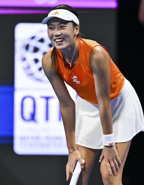 (260211) -- DOHA, Feb. 11, 2026 (Xinhua) -- Wang Xinyu of China reacts during the women's singles round of 32 match between Wang Xinyu of China and Elena Rybakina of Kazakhstan at the WTA Qatar Open 2026 tennis tournament in Doha, Qatar, on Feb. 10, 2026. (Photo by Nikku/Xinhua)