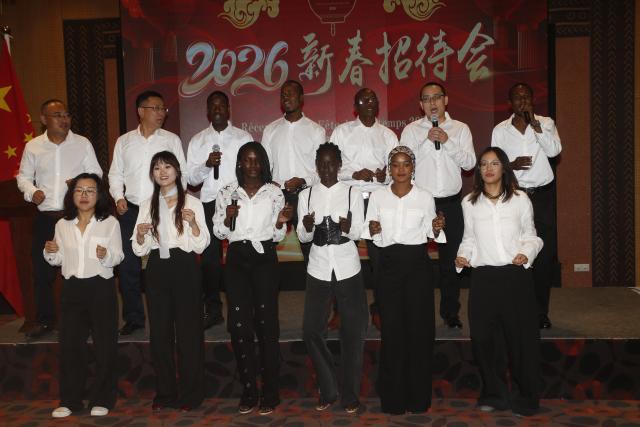 (260211) -- DAKAR, Feb. 11, 2026 (Xinhua) -- Teachers and students from the Confucius Institute at Cheikh Anta Diop University of Dakar perform a Chinese song at a Spring Festival reception in Dakar, capital of Senegal, Feb. 9, 2026. The Chinese Embassy in Senegal on Monday evening hosted a Spring Festival reception in Dakar, the capital of the West African country, gathering over 200 guests, including Secretary of State for Senegalese Abroad Amadou Cherif Diouf. (Photo by Aliou Mbaye/Xinhua)