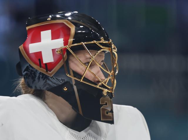 (260211) -- MILAN, Feb. 11, 2026 (Xinhua) -- Switzerland's goalkeeper Saskia Maurer reacts during the ice hockey women's preliminary round group A match between Finland and Switzerland of the Milan-Cortina 2026 Olympic Winter Games in Milan, Italy, Feb. 10, 2026. (Xinhua/Wang Kaiyan)