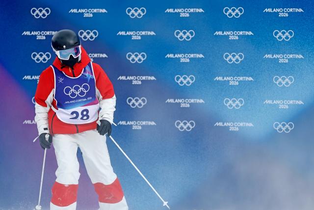 (260211) -- LIVIGNO, Feb. 11, 2026 (Xinhua) -- Li Ruilin of China reacts during the freestyle skiing women's moguls qualification at the Milan-Cortina 2026 Olympic Winter Games in Livigno, Italy, Feb. 11, 2026. (Xinhua/Wang Peng)