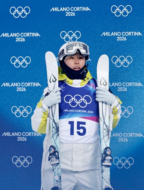 (260211) -- LIVIGNO, Feb. 11, 2026 (Xinhua) -- Ayaulym Amrenova of Kazakhstan reacts during the freestyle skiing women's moguls qualification at the Milan-Cortina 2026 Olympic Winter Games in Livigno, Italy, Feb. 11, 2026. (Xinhua/Wang Peng)