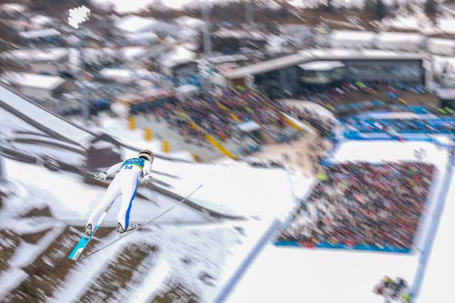 (260211) -- PREDAZZO, Feb. 11, 2026 (Xinhua) -- Vid Vrhovnik of Slovenia competes during the Nordic Combined Individual Gundersen Normal Hill/10km at the 2026 Milan-Cortina Winter Olympics in Predazzo, Italy, Feb. 11, 2026. (Xinhua/Huang Wei)