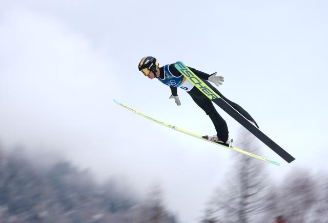 (260211) -- PREDAZZO, Feb. 11, 2026 (Xinhua) -- Zhao Zihe of China competes during the Nordic Combined Individual Gundersen Normal Hill/10km at the 2026 Milan-Cortina Winter Olympics in Predazzo, Italy, Feb. 11, 2026. (Xinhua/Meng Yongmin)