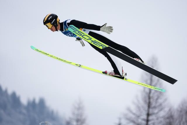 (260211) -- PREDAZZO, Feb. 11, 2026 (Xinhua) -- Zhao Zihe of China competes during the Nordic Combined Individual Gundersen Normal Hill/10km at the 2026 Milan-Cortina Winter Olympics in Predazzo, Italy, Feb. 11, 2026. (Xinhua/Meng Yongmin)