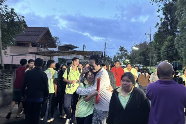 (260211) -- BANGKOK, Feb. 11, 2026 (Xinhua) -- People gather at the school where a shooting took place in the Hat Yai district of Songkhla province, Thailand, Feb. 11, 2026. Thai police confirmed on Wednesday that a gunman has been taken into custody following a school shooting earlier Wednesday in the southern province of Songkhla. (Xinhua)