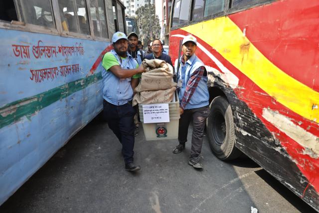 (260211) -- DHAKA, Feb. 11, 2026 (Xinhua) -- Staff members carry ballot boxes ahead of the general election in Dhaka, Bangladesh, Feb. 11, 2026. Bangladesh is all set for Thursday's general elections in which more than 127 million voters are expected to cast their ballots at over 42,000 polling stations across the country, a senior official said Tuesday. (Photo by Habibur Rahman/Xinhua)