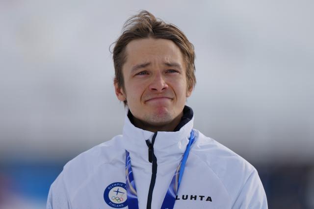 (260211) -- TESERO, Feb. 11, 2026 (Xinhua) -- Bronze medalist Eero Hirvonen of Finland attends the awarding ceremony of the Nordic Combined Individual Gundersen Normal Hill/10km at the Milan-Cortina 2026 Olympic Winter Games in Tesero, Italy, Feb. 11, 2026. (Xinhua/Peng Ziyang)