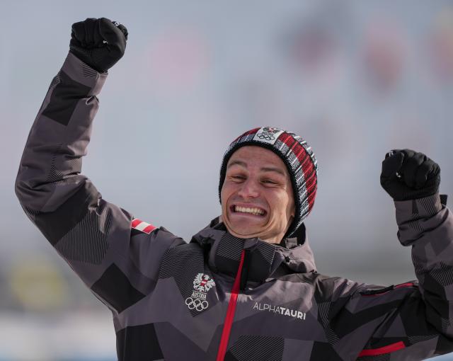 (260211) -- TESERO, Feb. 11, 2026 (Xinhua) -- Silver medalist Johannes Lamparter of Austria celebrates during the awarding ceremony of the Nordic Combined Individual Gundersen Normal Hill/10km at the Milan-Cortina 2026 Olympic Winter Games in Tesero, Italy, Feb. 11, 2026. (Xinhua/Peng Ziyang)