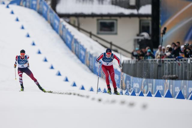 (260211) -- TESERO, Feb. 11, 2026 (Xinhua) -- Jens Luraas Oftebro (R) of Norway competes during the Cross-Country competition of Nordic Combined Individual Gundersen Normal Hill/10km at the Milan-Cortina 2026 Olympic Winter Games in Tesero, Italy, Feb. 11, 2026. (Xinhua/Peng Ziyang)