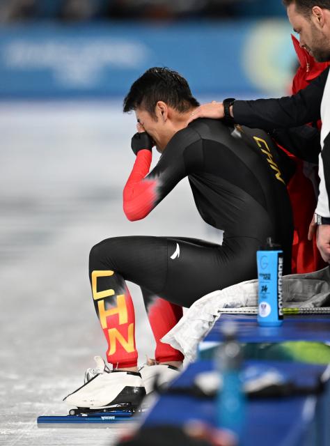 (260211) -- MILAN, Feb. 11, 2026 (Xinhua) -- Ning Zhongyan of China reacts after the speed skating men's 1000m competition at the Milan-Cortina 2026 Olympic Winter Games in Milan, Italy, Feb. 11, 2026. (Xinhua/Wu Wei)