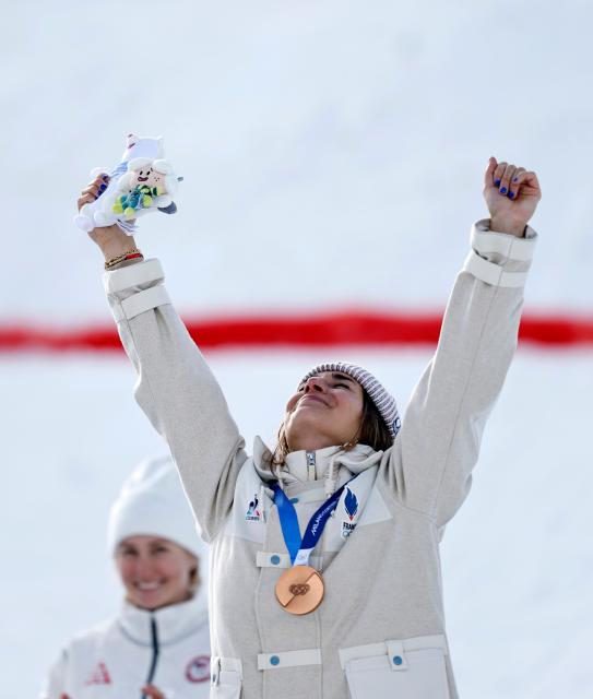 (260211) -- LIVIGNO, Feb. 11, 2026 (Xinhua) -- Bronze medalist Perrine Laffont of France celebrates during the awarding ceremony after the freestyle skiing women's moguls final at the Milan-Cortina 2026 Olympic Winter Games in Livigno, Italy, Feb. 11, 2026. (Xinhua/Wang Peng)