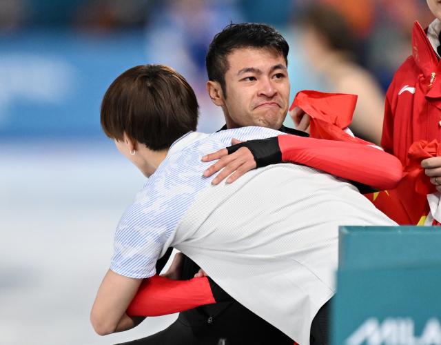 (260211) -- MILAN, Feb. 11, 2026 (Xinhua) -- Ning Zhongyan (R) of China celebrates after the speed skating men's 1000m competition at the Milan-Cortina 2026 Olympic Winter Games in Milan, Italy, Feb. 11, 2026. (Xinhua/Wu Wei)