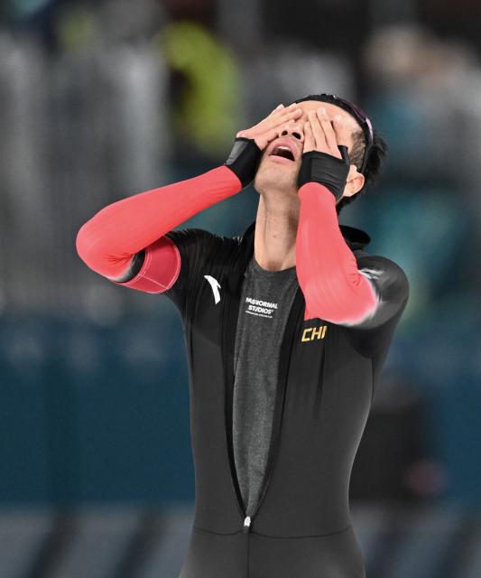 (260211) -- MILAN, Feb. 11, 2026 (Xinhua) -- Ning Zhongyan of China reacts after the speed skating men's 1000m competition at the Milan-Cortina 2026 Olympic Winter Games in Milan, Italy, Feb. 11, 2026. (Xinhua/Wu Wei)
