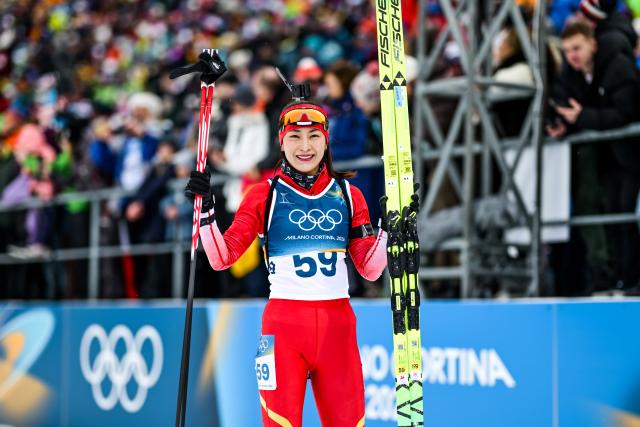 (260211) -- ANTERSELVA, Feb. 11, 2026 (Xinhua) -- Meng Fanqi of China poses for a photo after the biathlon women's 15km individual match at the Milan-Cortina 2026 Olympic Winter Games in Anterselva, Italy, Feb. 11, 2026. (Xinhua/Jiang Han)