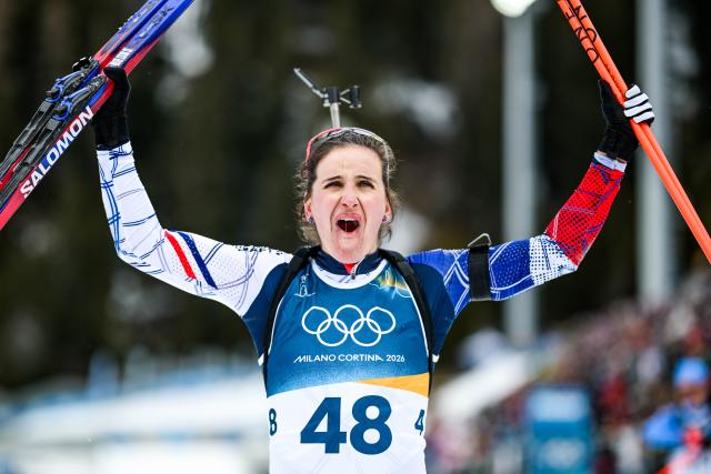 (260211) -- ANTERSELVA, Feb. 11, 2026 (Xinhua) -- Julia Simon of France celebrates after the biathlon women's 15km individual match at the Milan-Cortina 2026 Olympic Winter Games in Anterselva, Italy, Feb. 11, 2026. (Xinhua/Jiang Han)