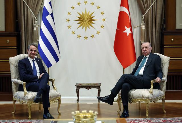 (260211) -- ANKARA, Feb. 11, 2026 (Xinhua) -- Turkish President Recep Tayyip Erdogan (R) and visiting Greek Prime Minister Kyriakos Mitsotakis pose for a group photo before their meeting at Presidential Complex in Ankara, Türkiye, on Feb. 11, 2026. Türkiye and Greece should maintain open dialogue and deepen cooperation as they face shared regional challenges, Turkish President Recep Tayyip Erdogan said Wednesday. (Mustafa Kaya/Handout via Xinhua)