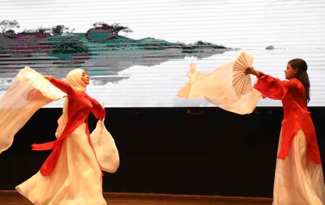 (260211) -- CAIRO, Feb. 11, 2026 (Xinhua) -- Egyptian Students perform during a Chinese New Year celebration at Ain Shams University in Cairo, Egypt, on Feb. 10, 2026. A Chinese New Year celebration for the Year of the Horse was held Tuesday at Ain Shams University in Cairo, bringing together Chinese teachers and Egyptian students for a festive showcase of cultural exchange and deepening friendship. (Xinhua/Ahmed Gomaa)