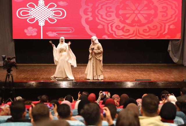 (260211) -- CAIRO, Feb. 11, 2026 (Xinhua) -- Egyptian Students perform during a Chinese New Year celebration at Ain Shams University in Cairo, Egypt, on Feb. 10, 2026. A Chinese New Year celebration for the Year of the Horse was held Tuesday at Ain Shams University in Cairo, bringing together Chinese teachers and Egyptian students for a festive showcase of cultural exchange and deepening friendship. (Xinhua/Ahmed Gomaa)