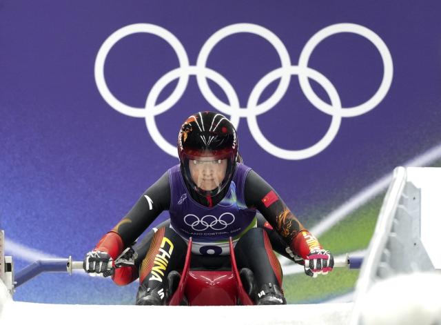 (260211) -- CORTINA D'AMPEZZO, Feb. 11, 2026 (Xinhua) -- Zhao Jiaying/Gulijienaiti Adikeyoumu (front) of China compete during the luge women's doubles run 1 at the Milan-Cortina 2026 Olympic Winter Games in Cortina, Italy, Feb. 11, 2026. (Xinhua/Li Gang)