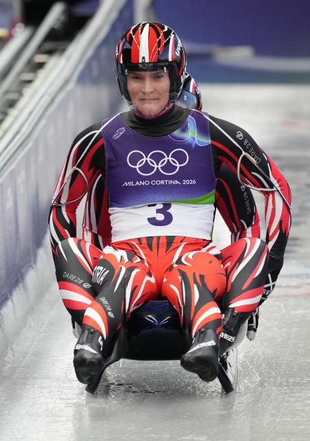 (260211) -- CORTINA D'AMPEZZO, Feb. 11, 2026 (Xinhua) -- Selina Egle/Lara Michael Kipp of Austria compete during the luge women's doubles run 1 at the Milan-Cortina 2026 Olympic Winter Games in Cortina, Italy, Feb. 11, 2026. (Xinhua/Li Gang)