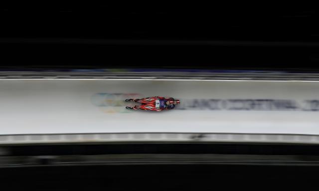 (260211) -- CORTINA D'AMPEZZO, Feb. 11, 2026 (Xinhua) -- Selina Egle/Lara Michael Kipp of Austria compete during the luge women's doubles run 2 at the Milan-Cortina 2026 Olympic Winter Games in Cortina, Italy, Feb. 11, 2026. (Xinhua/Li Gang)