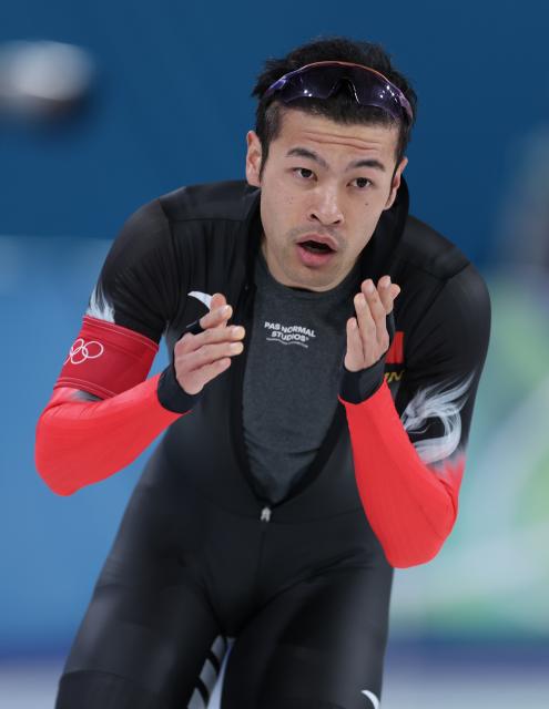 (260212) -- MILAN, Feb. 12, 2026 (Xinhua) -- Ning Zhongyan of China reacts after the speed skating men's 1000m match at the Milan-Cortina 2026 Olympic Winter Games in Milan, Italy, Feb. 11, 2026. (Xinhua/Du Xiaoyi)