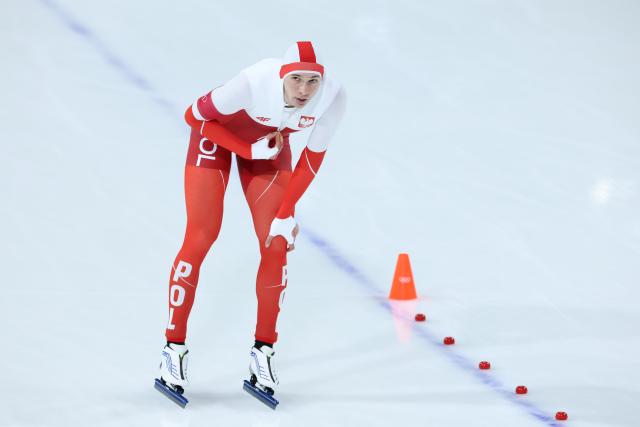 (260212) -- MILAN, Feb. 12, 2026 (Xinhua) -- Marek Kania of Poland reacts after the speed skating men's 1000m match at the Milan-Cortina 2026 Olympic Winter Games in Milan, Italy, Feb. 11, 2026. (Xinhua/Li Jing)
