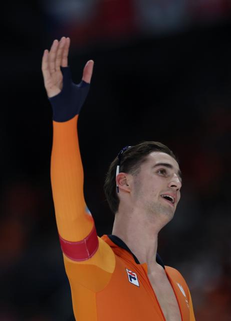 (260212) -- MILAN, Feb. 12, 2026 (Xinhua) -- Jenning de Boo the Netherlands reacts after the speed skating men's 1000m match at the Milan-Cortina 2026 Olympic Winter Games in Milan, Italy, Feb. 11, 2026. (Xinhua/Li Jing)