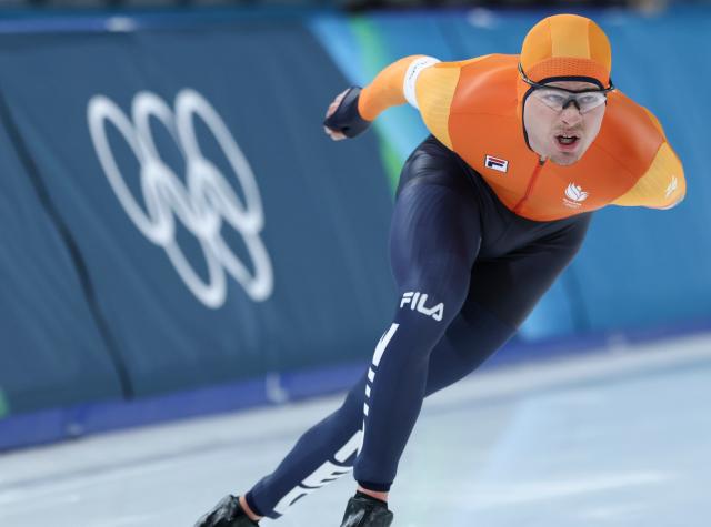(260212) -- MILAN, Feb. 12, 2026 (Xinhua) -- Joep Wennemars of the Netherlands competes during the speed skating men's 1000m match at the Milan-Cortina 2026 Olympic Winter Games in Milan, Italy, Feb. 11, 2026. (Xinhua/Li Jing)