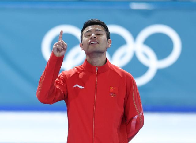 (260212) -- MILAN, Feb. 12, 2026 (Xinhua) -- Ning Zhongyan of China gestures during the awarding ceremony of the speed skating men's 1000m match at the Milan-Cortina 2026 Olympic Winter Games in Milan, Italy, Feb. 11, 2026. (Xinhua/Li Jing)