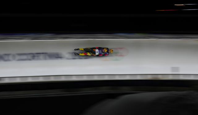 (260211) -- CORTINA D'AMPEZZO, Feb. 11, 2026 (Xinhua) -- Tobias Wendl/Tobias Arlt of Germany compete during of the luge men's doubles run 2 at the Milan-Cortina 2026 Olympic Winter Games in Cortina, Italy, Feb. 11, 2026. (Xinhua/Li Gang)