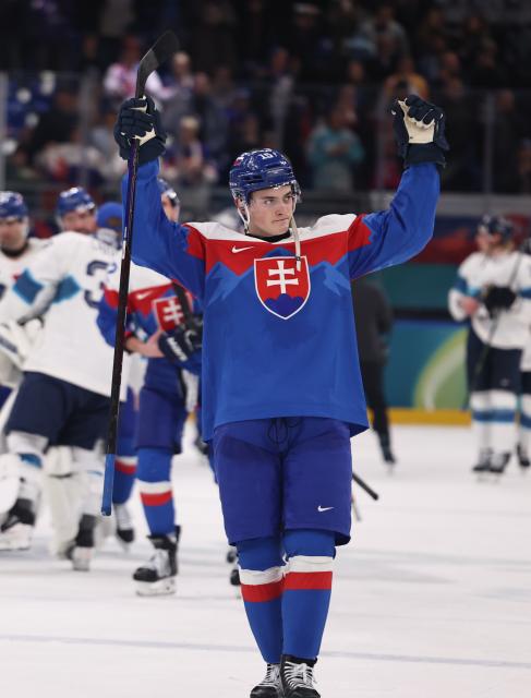 (260212) -- MILAN, Feb. 12, 2026 (Xinhua) -- Dalibor Dvorsky of Slovakia celebrates victory after the ice hockey men's preliminary round group B match between Finland and Slovakia at the Milan-Cortina 2026 Olympic Winter Games in Milan, Italy, Feb. 11, 2026. (Xinhua/Wang Kaiyan)